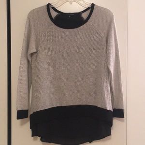 Black and white sweater with silky draping